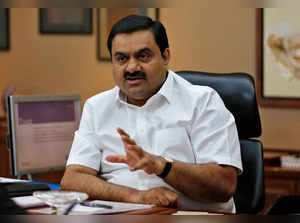 FILE PHOTO: Indian billionaire Adani speaks during an interview with Reuters at his office in Ahmedabad