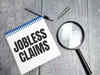 US weekly jobless claims fall slightly