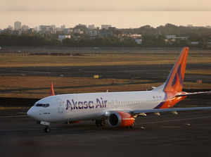 An Akasa Air passenger aircraft taxis on the tarmac at Chhatrapati Shivaji International Airport in Mumbai