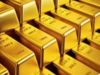 Gold prices poised for monthly gain; focus on US data