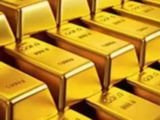 Gold prices poised for monthly gain; focus on US data