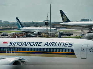 FILE PHOTO: FILE PHOTO: Singapore Airlines planes sit on the tarmac at Changi Airport in Singapore