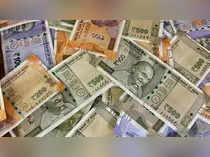 Rupee declines tracking weakness in regional peers