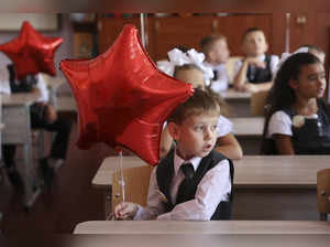 Ukraine's children return to school as Russia launches drones and ballistic missiles at Kyiv