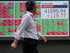 Japan's Nikkei slips as yen gains; higher bond yields lift banks