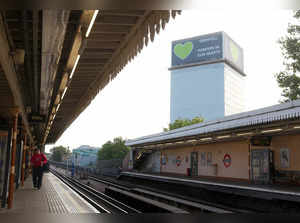 Covered remains of Grenfell Tower seen, as report from UK public inquiry into the deadly 2017 Grenfell fire published, in London