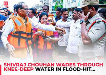 Andhra Pradesh rains: Union Minister Shivraj Chouhan wades through knee-deep water in flood-hit Vijayawada