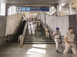 Kolkata: Police personnel arrive to keep a vigil during a protest march by BJP M...