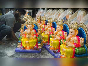 Thane: A worker sets up lord Ganesh idols ahead of the 'Ganesh Chaturthi' festiv...