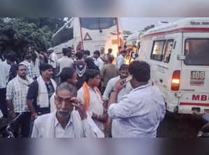 Hathras: People gather near the road accident site between a roadways bus and a ...