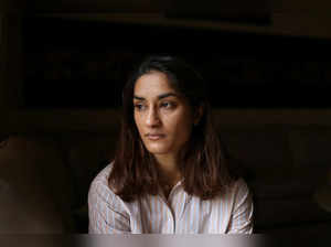 Indian wrestler Vinesh Phogat poses for a picture after an interview with Reuters at her residence in Sonipat in the northern state of Haryana