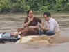 Gujarat Rain: Couple spends 2 hours relaxed and talking atop submerged car in heavily flooded Sabarkantha river. Watch viral video