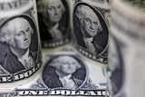 US dollar perks up as traders reduce bets on larger Fed rate cut