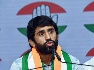 New Delhi, Sept 06 (ANI): Wrestler Bajrang Punia addresses after joining the Con...