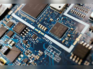 FILE PHOTO: Illustration picture of semiconductor chips on a circuit board