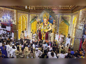 Mumbai: Devotees offer prayers to Lord Ganesh at the Lalbaugcha Raja on Ganesh C...