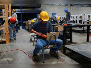 Inmates work under "Plan Cero Ocio" (Zero Leisure Plan) in Salvadoran jails