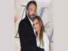 Wife swap? After Matt Damon holds Jennifer Lopez's hand, Ben Affleck kisses his wife Barroso's head