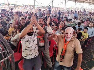 Doda, Sep 14 (ANI): Supporters cheer during Prime Minister Narendra Modi's publi...