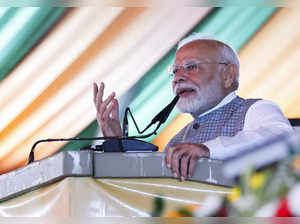 **EDS: IMAGE VIA PMO** Jamshedpur: Prime Minister Narendra Modi speaks during a ...