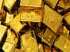 Gold hovers near record high on prospects of bigger Fed rate cut