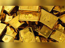 Gold hovers near record high on prospects of bigger Fed rate cut