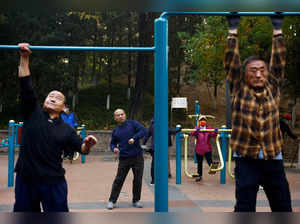 FILE PHOTO: China approves plan to raise retirement age from January 2025