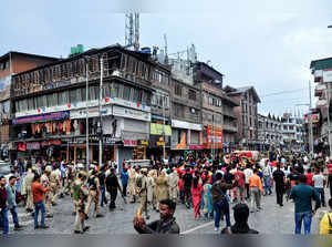 Kashmiri Pandits participate in a religious procession t...