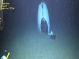 US Coast Guard reveals first image of Titan submersible wreckage amid ongoing hearing