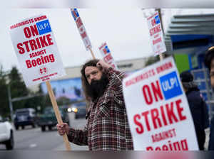 Boeing says it's considering temporary layoffs to save cash during the strike by machinists