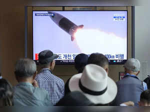 Kim calls for bolstering nuclear and conventional weapons after testing 2 types of missiles