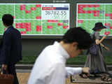 Japan's Nikkei at over two-week closing high as exporters advance on weaker yen