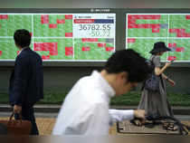 Japan's Nikkei at over two-week closing high as exporters advance on weaker yen