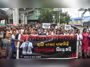 Kolkata: Medics take part in a protest march to Swasthya Bhavan over the alleged...