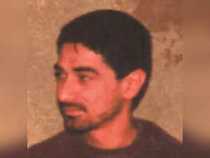 An undated photograph of Ibrahim Aqil appears on a wanted poster circulated by the U.S. Department of State's Diplomatic Security Service entity "Rewards for Justice