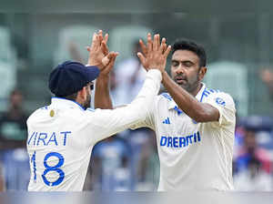 Chennai:  India's Ravichandran Ashwin with teammate celebrates the dismissal of ...