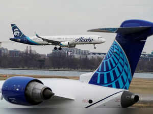 FILE PHOTO: An Alaska Airlines aircraft lands at Reagan National Airport in Arlington, Virginia