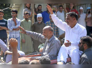 Budgam: MP and Awami Ittehad Party chief Sheikh Abdul Rashid with party candidat...