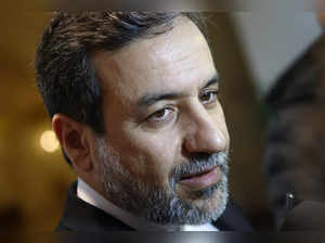 Iran's top nuclear negotiator Araqchi talks to journalists after meeting senior officials from the United States, Russia, China, Britain, Germany and France in a hotel in Vienna