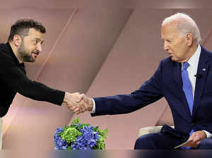 FILE PHOTO: Ukraine's Zelenskiy and US President Biden are shown in Washington