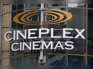 FILE PHOTO: A Cineplex movie theatre sign looms over Yonge street in Toronto