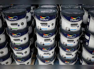 FILE PHOTO: Cans of Dulux paint, an AkzoNobel brand, are seen on the shelf of a DIY retail store in Manchester, Britain