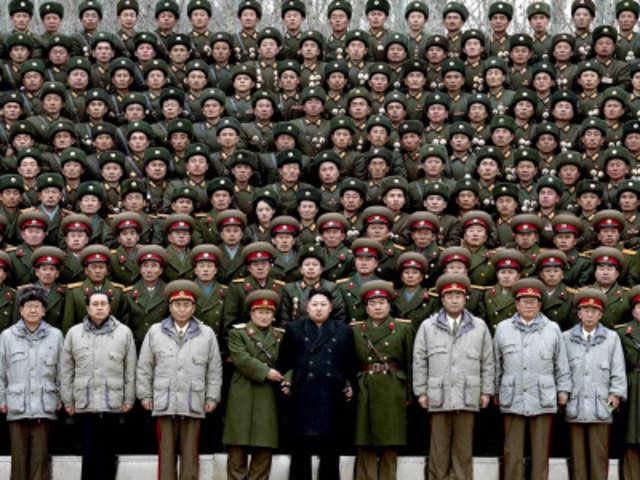 New North Korean leader Kim Jong-Un pose with soildiers