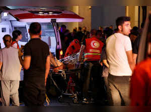 FILE PHOTO: A person is carried outside American University of Beirut Medical Center, including Hezbollah fighters and medics, were wounded and killed when the pagers they use to communicate exploded across Lebanon, according to a security source, in Beiru