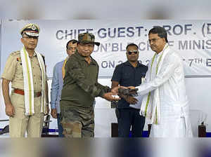 West Tripura: Tripura Chief Minister Manik Saha receives arms from an extremist ...