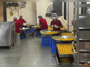 **EDS: WITH STORY** Mumbai: Laddus being made at the Siddhivinayak Prasad Gruha ...