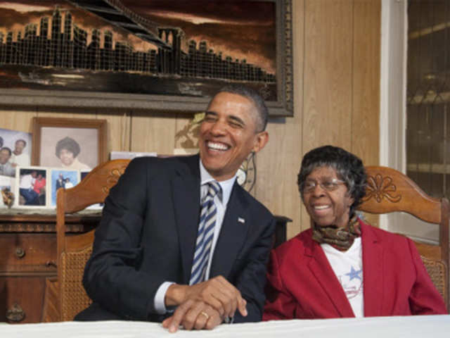 US President Barack Obama smiles with Endia Eason
