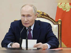 Putin lowers threshold of nuclear response as he issues new warnings to the West over Ukraine