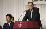 Nine ruling party candidates in Japan vie to replace outgoing Prime Minister