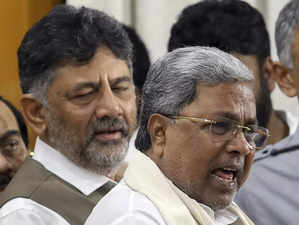 Bengaluru: Karnataka Chief Minsiter Siddaramaiah with his Deputy DK Shivakumar a...